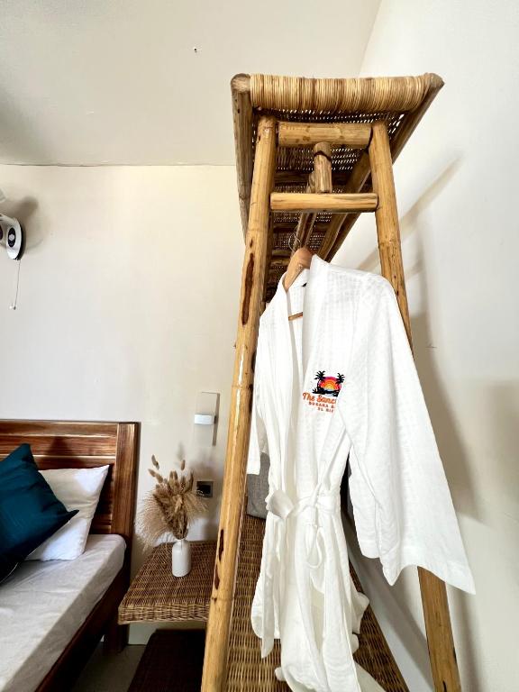 The Beach Suite with woven bed frame steps from the sand